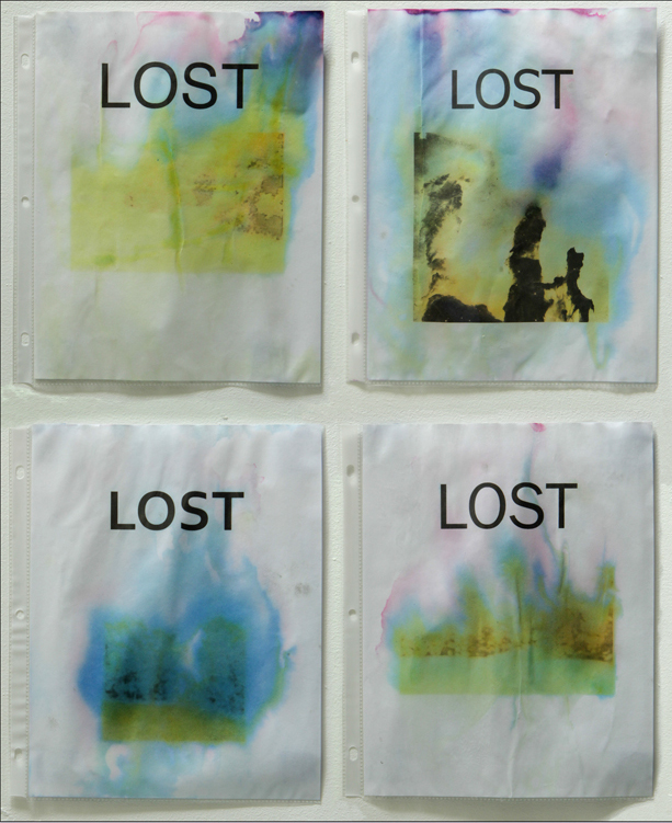 Lost. Inkjet on paper, exposed to water and sunlight, in plastic sheet protectors