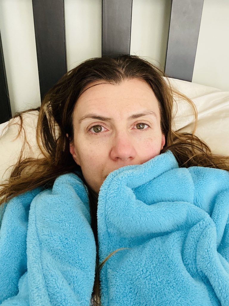 Sick in bed at home